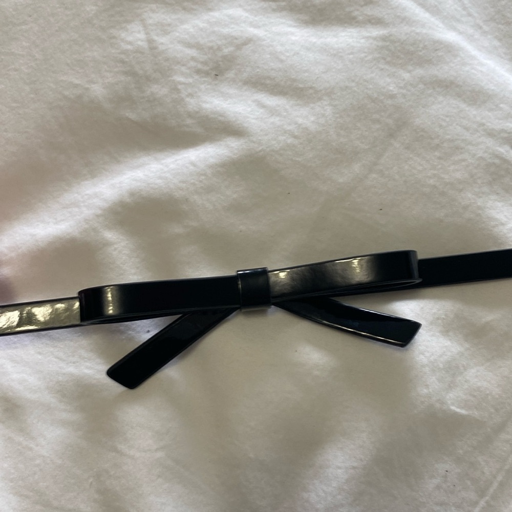 Black belt with bow.